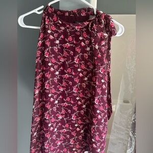 Sleeveless Top with Ribbon/Neck Bow Detail pieces of shimmer run throughout!